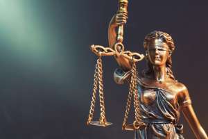 Lady Justice Statue Weighing Guilt vs Innocence